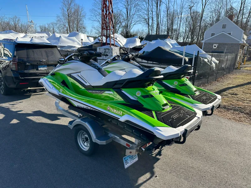 Slide: The Image of Two green 2021 Yamaha WaveRunner FX Cruiser HO on a trailer. - 3