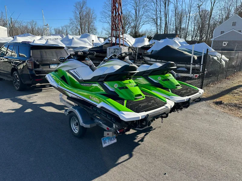 Slide: The Image of Two green Yamaha WaveRunner FX Cruiser HO 2021 on a trailer. - 4