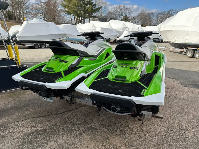 Slide: The Image of Two green 2021 Yamaha WaveRunner FX Cruiser HO jet skis on a trailer. - 6