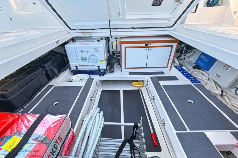 Slide: The Image of 2024 Back Cove 390 Yacht with huge storage area below cockpit sole - raises electrically - 65