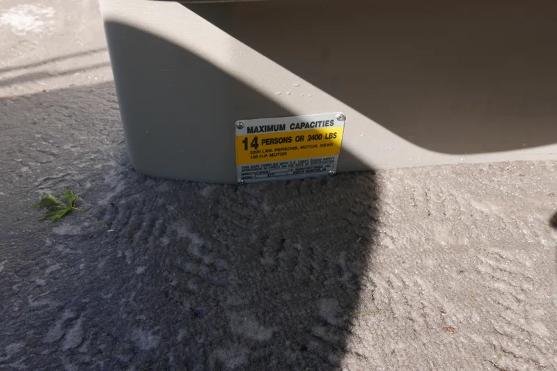Slide: The Image of Capacity label on 2008 JC SunToon 21TT boat, indicating 14 persons or 2400 lbs. - 12