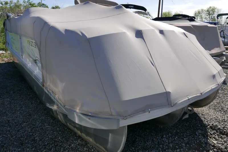 Slide: The Image of Covered 2008 JC SunToon 21TT pontoon boat on gravel lot. - 14