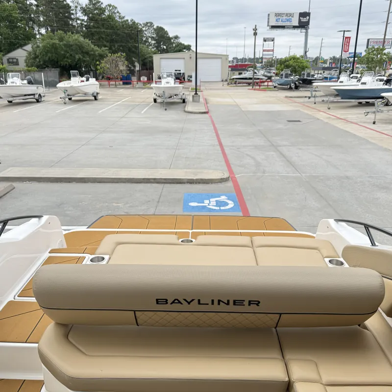 Slide: The Image of Bayliner D22I 2025 on a parking lot with boats. - 15