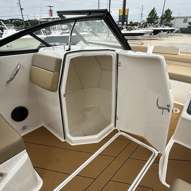 Slide: The Image of Interior of 2025 Bayliner D22I with open cabin door. - 23