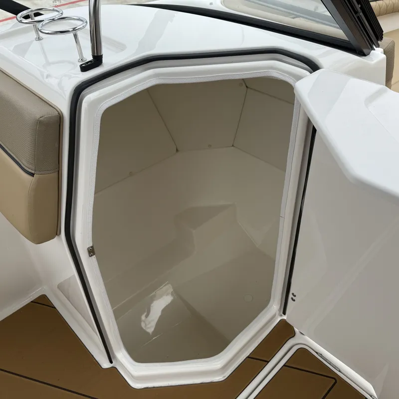 Slide: The Image of Interior of Bayliner D22I 2025 with open door. - 24