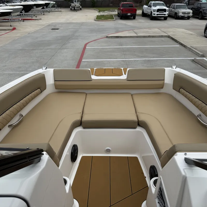 Slide: The Image of Interior of 2025 Bayliner D22I with beige seating. - 26