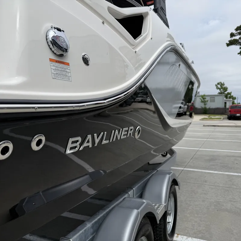 Slide: The Image of Close-up of a 2025 Bayliner D22I boat on a trailer. - 42