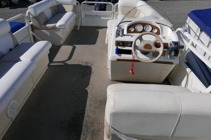 Slide: The Image of 2008 Bentley Pontoons 200 CRUISE interior with steering console and cushioned seating. - 13
