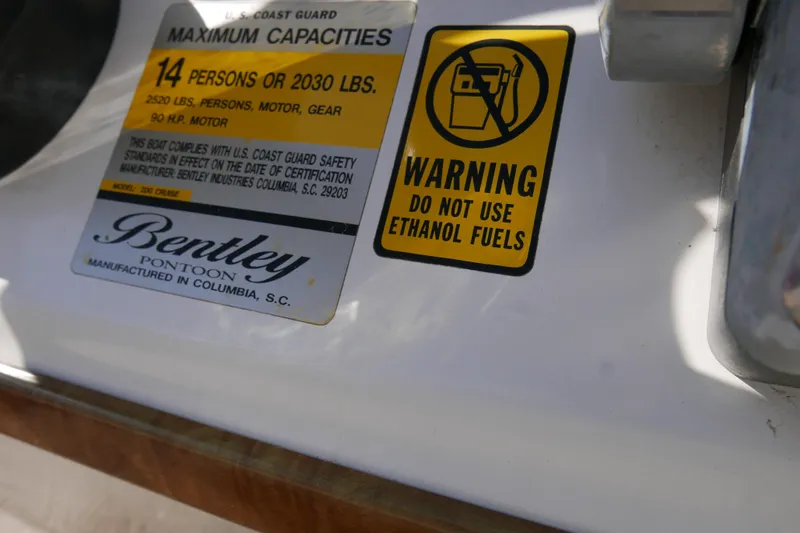 Slide: The Image of 2008 Bentley Pontoons 200 CRUISE capacity label, warning against ethanol fuel use. - 14