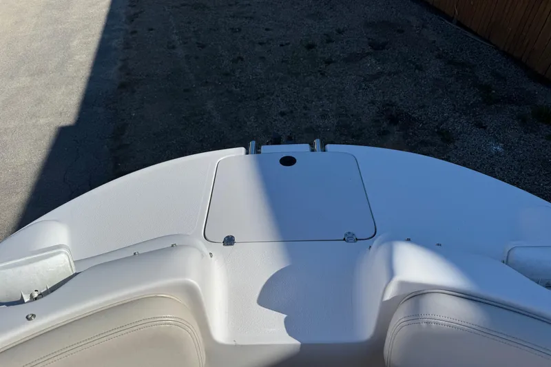 Slide: The Image of 1997 Chaparral 232 Sunesta boat deck with storage compartment, viewed from above. - 11