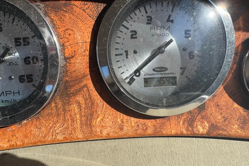 Slide: The Image of Dashboard of a 1997 Chaparral 232 Sunesta showing RPM and speed gauges. - 19