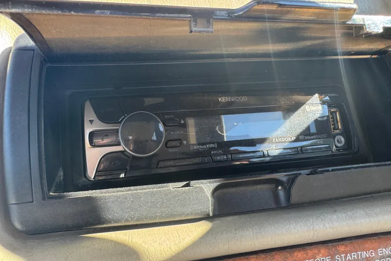 Slide: The Image of Kenwood stereo system in a 1997 Chaparral 232 Sunesta boat dashboard. - 7