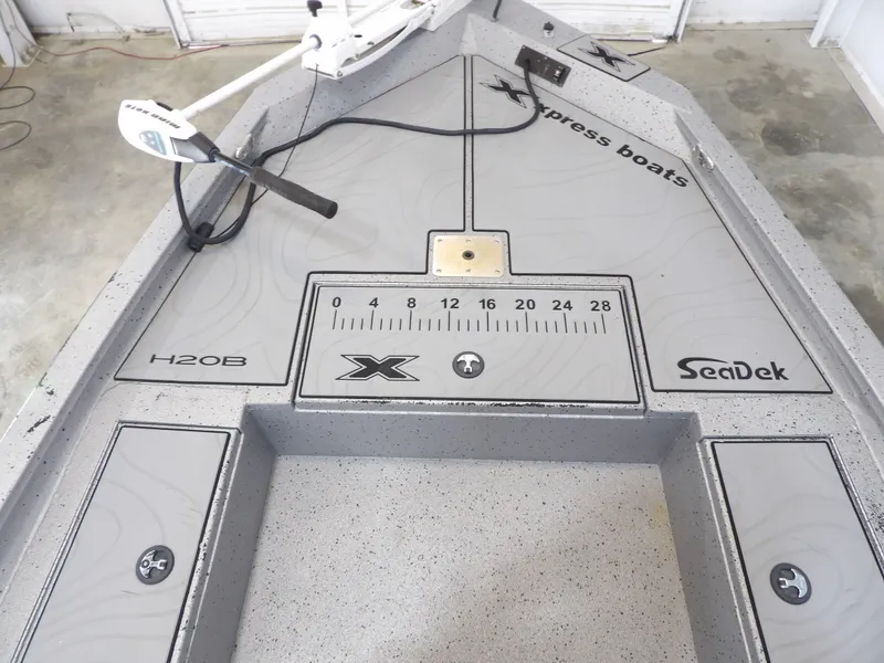 Slide: The Image of 2019 Xpress H20B Bay boat with SeaDek flooring. - 11