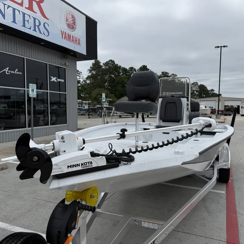 Slide: The Image of 2026 Xpress H22BAY boat with Minn Kota Terrova motor. - 3