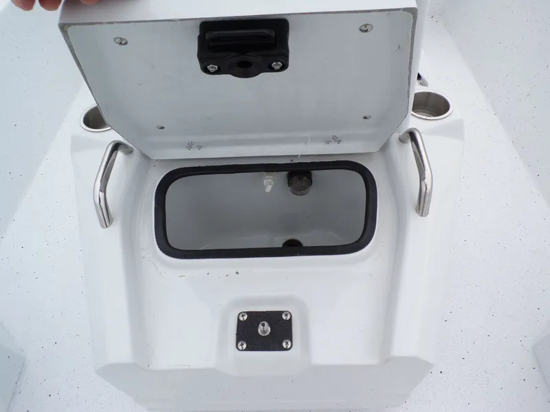 Slide: The Image of Open storage compartment on Xpress SW20B boat, year 2026. - 17
