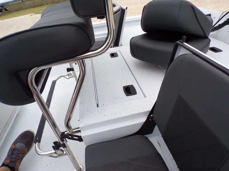 Slide: The Image of Interior of Xpress SW20B boat, 2026 model, featuring black seating. - 8