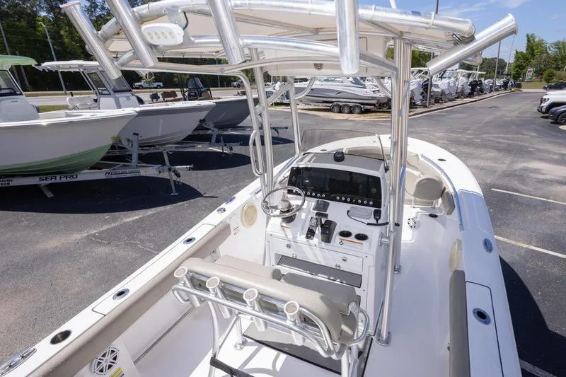 Slide: The Image of 2021 Sportsman Heritage 211 Center Console boat with sleek design and modern controls. - 11