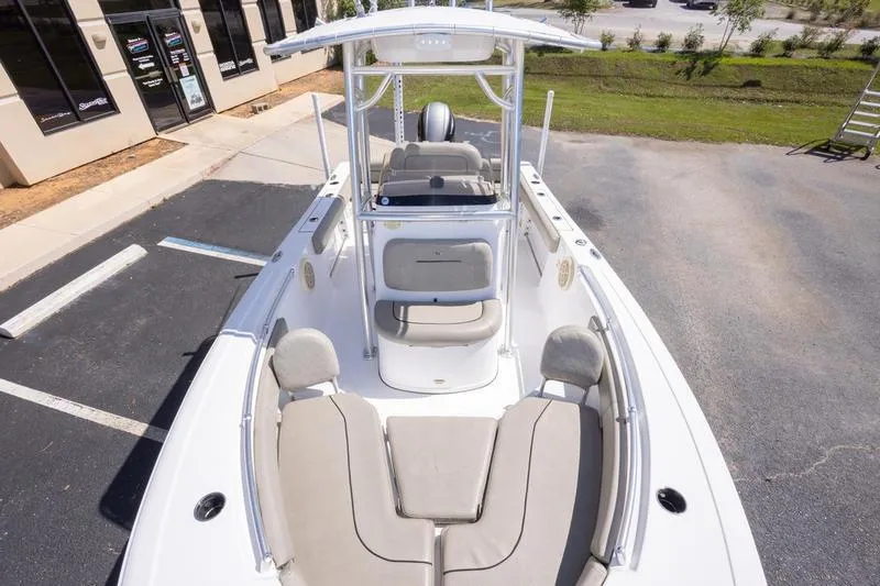 Slide: The Image of 2021 Sportsman Heritage 211 Center Console boat with spacious seating and modern design. - 23