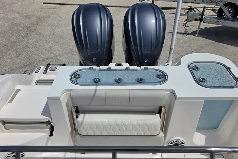 Slide: The Image of 2023 Sea Fox 288 Commander boat with dual engines and seating area. - 16