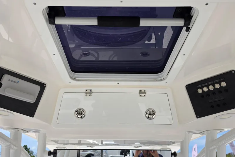 Slide: The Image of 2023 Sea Fox 288 Commander boat interior with hatch and control panel. - 18
