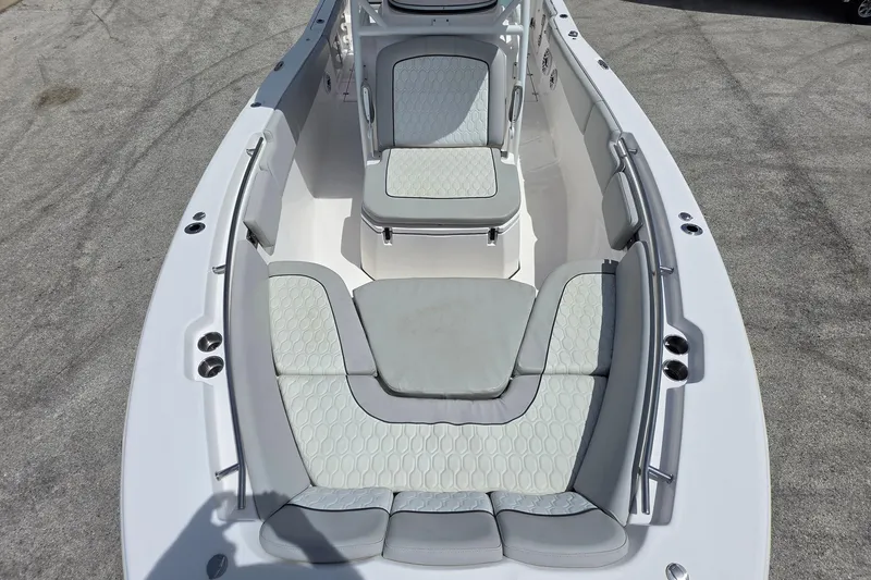 Slide: The Image of 2023 Sea Fox 288 Commander boat interior with cushioned seating and sleek design. - 22