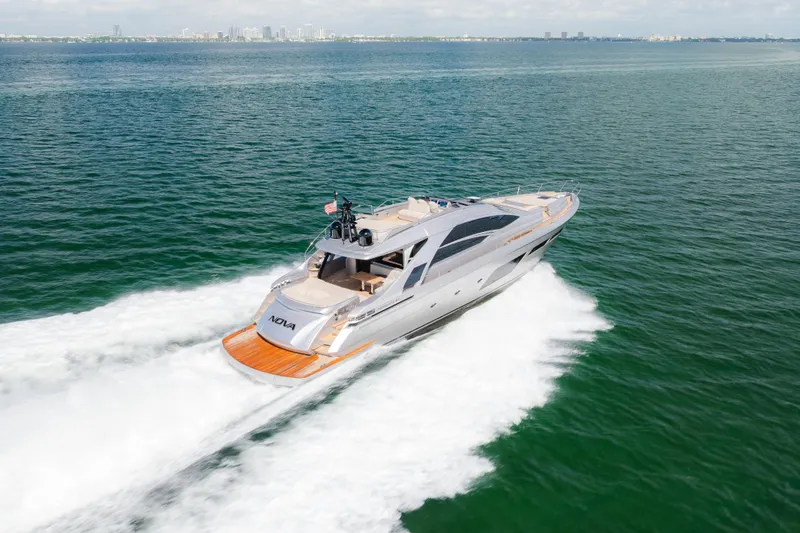 Slide: The Image of Luxury Pershing 8X yacht cruising on open water, 2021 model, sleek design. - 1