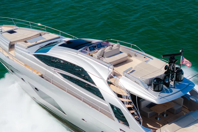 Slide: The Image of Luxurious 2021 Pershing 8X yacht cruising on vibrant blue waters. - 2