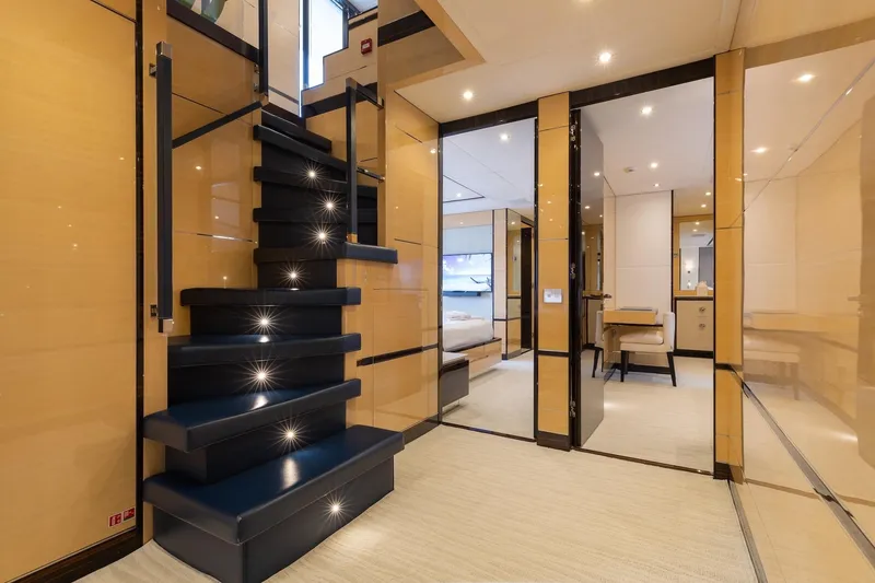 Slide: The Image of Luxurious interior of 2018 Benetti Fast 125 yacht with modern staircase and elegant design. - 21