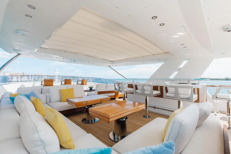 Slide: The Image of Luxurious 2018 Benetti Fast 125 yacht deck with elegant seating and ocean view. - 42