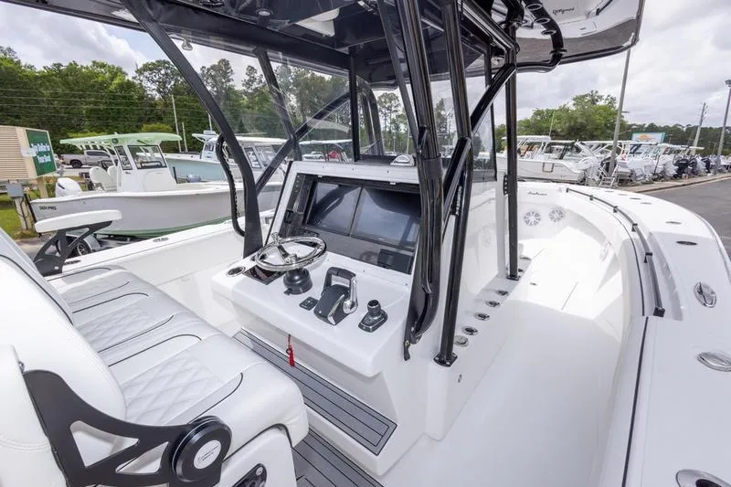 Slide: The Image of 2026 SeaHunter 33 Tournament boat cockpit with modern controls and seating. - 39
