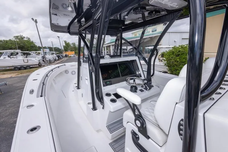 Slide: The Image of 2026 SeaHunter 33 Tournament boat interior with modern helm and seating. - 41