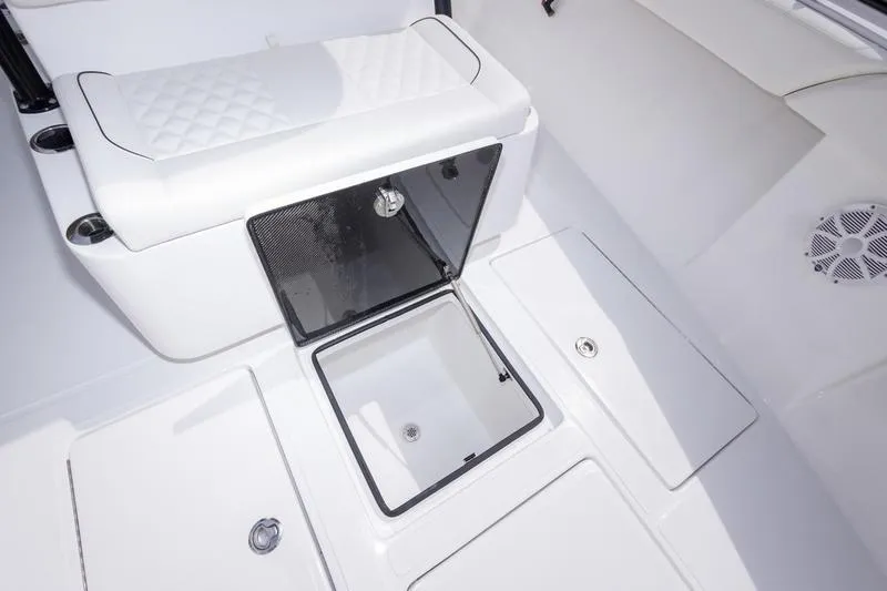 Slide: The Image of Interior view of 2026 SeaHunter 33 Tournament boat, featuring storage compartments and seating. - 47