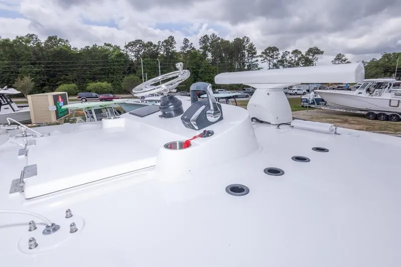 Slide: The Image of 2026 SeaHunter 33 Tournament boat deck with radar and anchor system. - 53