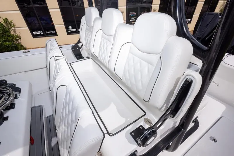 Slide: The Image of Luxurious white seating on 2026 SeaHunter 33 Tournament boat, showcasing premium design and comfort. - 6