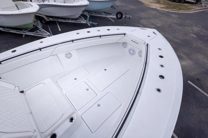 Slide: The Image of 2026 SeaHunter 33 Tournament boat deck with spacious seating and storage compartments. - 8