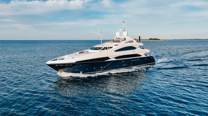 Slide: The Image of 2009 Sunseeker 121 yacht cruising on open water. - 0