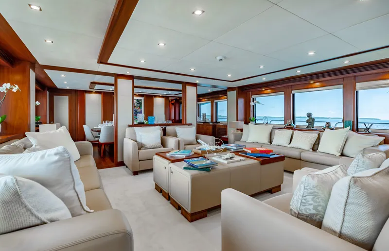 Slide: The Image of Luxurious interior of 2009 Sunseeker 121 yacht with plush seating and panoramic windows. - 11