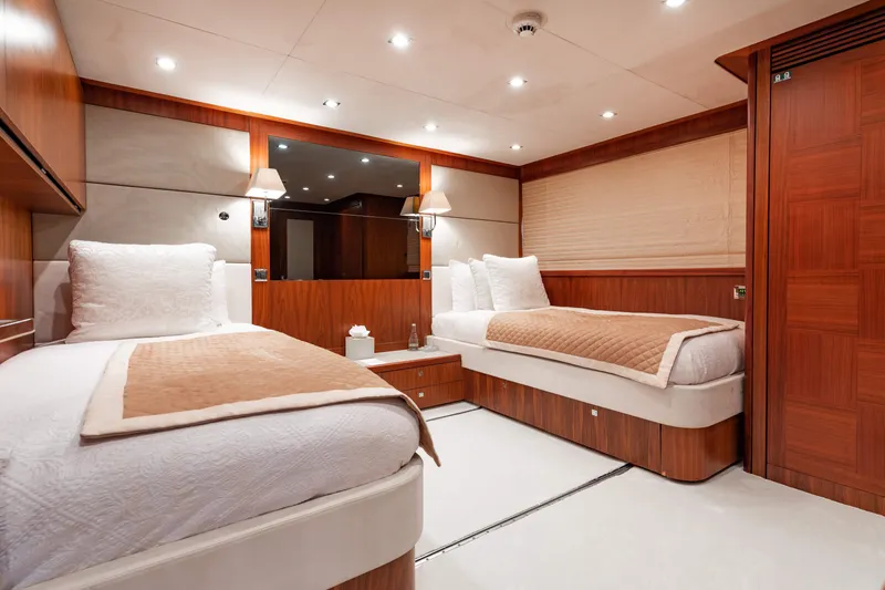 Slide: The Image of Luxurious twin bedroom on a 2009 Sunseeker 121 yacht. - 20