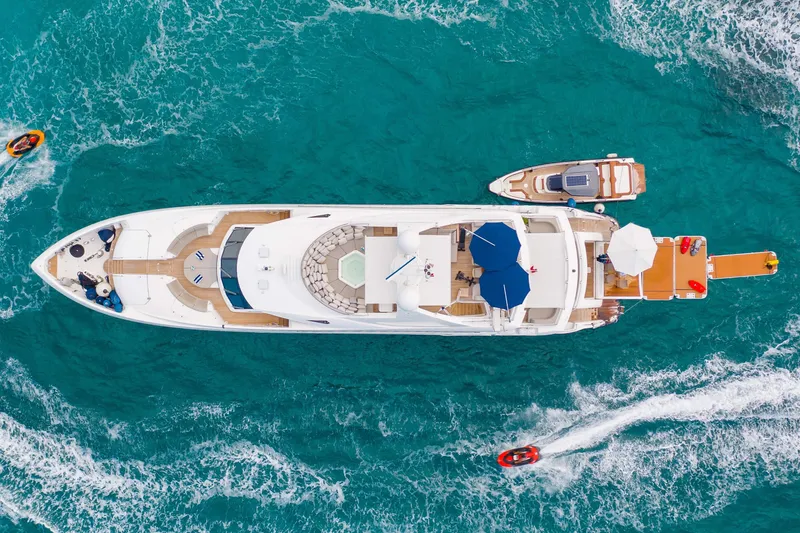 Slide: The Image of Aerial view of 2009 Sunseeker 121 yacht cruising in turquoise waters. - 3