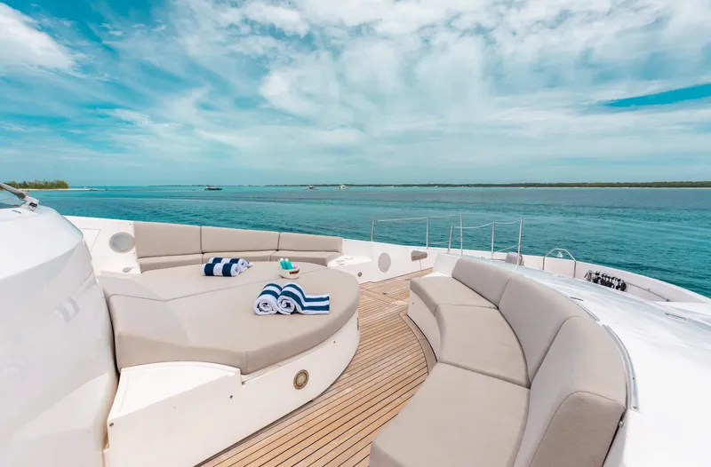 Slide: The Image of Luxurious 2009 Sunseeker 121 yacht deck with ocean view and comfortable seating. - 4