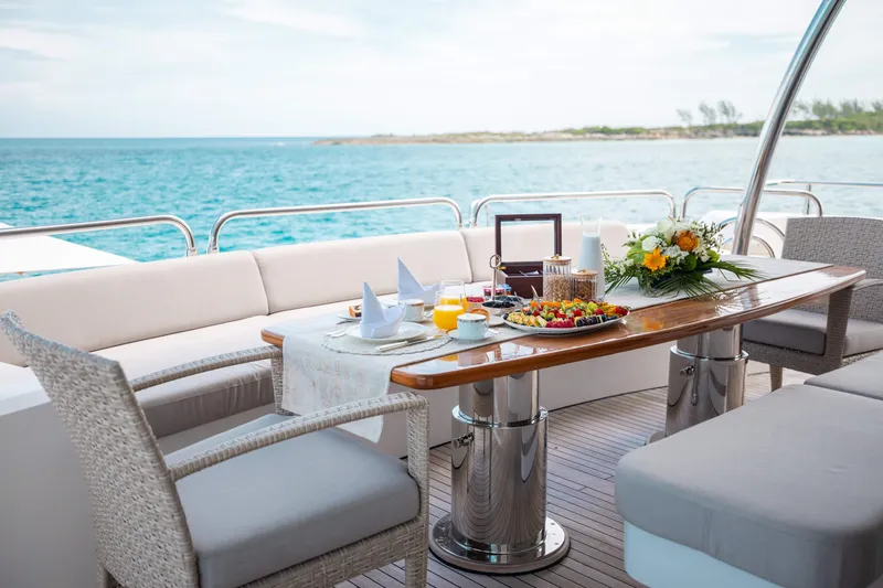 Slide: The Image of Luxury dining setup on Sunseeker 121 yacht, 2009 model, with ocean view. - 9