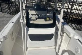 Slide: The Image of 2023 Trophy T22 boat interior with steering console and seating area. - 7