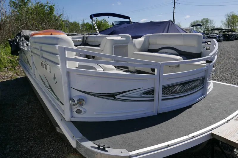 The Image of 2010 JC Neptoon 21TT pontoon boat with white seating and sleek design. - 0