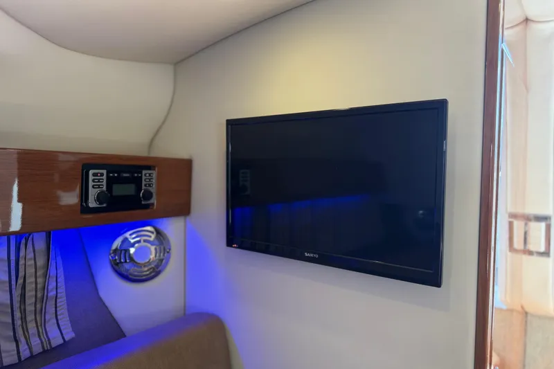 Slide: The Image of Interior of 2015 Formula 330 Crossover Bowrider with TV and audio system. - 26