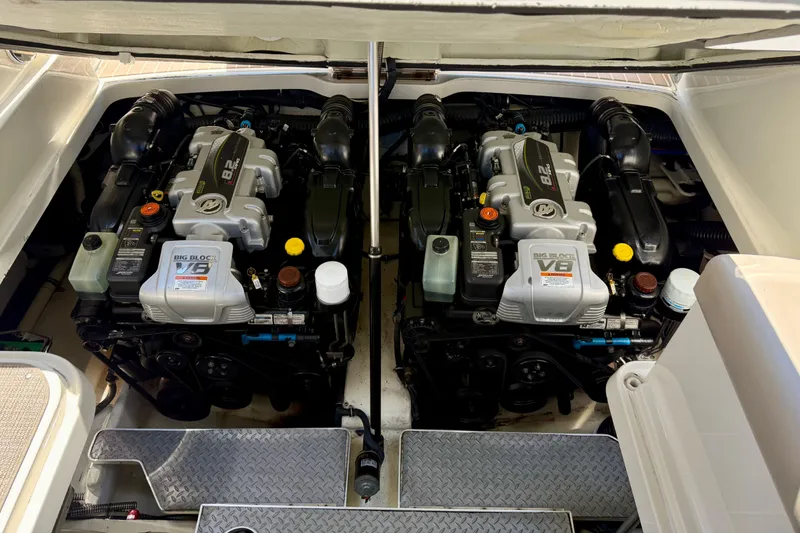 Slide: The Image of Twin V8 engines in a 2015 Formula 330 Crossover Bowrider boat engine compartment. - 31