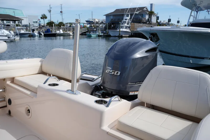 Slide: The Image of 2021 Grady-White Fisherman 216 boat with Yamaha 250 engine docked at marina. - 15