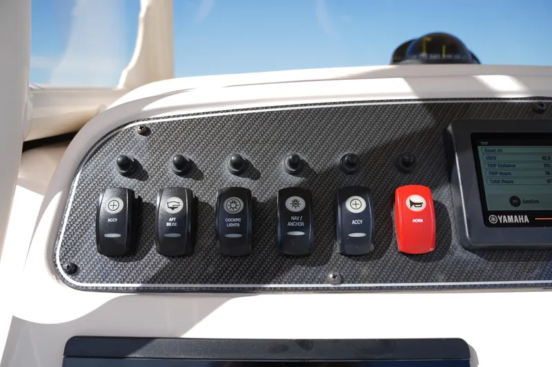 Slide: The Image of Dashboard controls of a 2021 Grady-White Fisherman 216 boat with Yamaha display. - 24