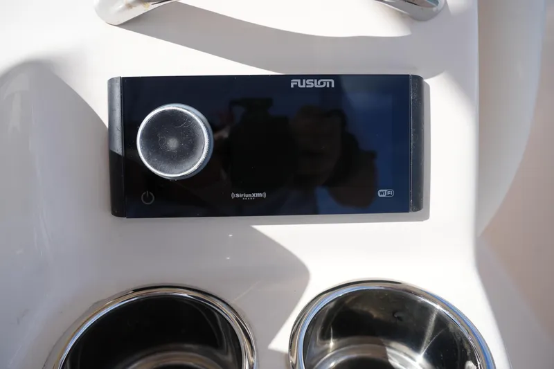Slide: The Image of Fusion audio system on 2021 Grady-White Fisherman 216 boat dashboard. - 26