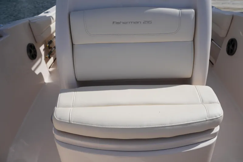 Slide: The Image of 2021 Grady-White Fisherman 216 boat seat, featuring white upholstery and sleek design. - 32
