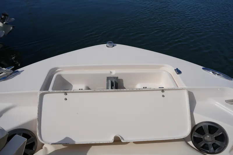 Slide: The Image of 2021 Grady-White Fisherman 216 boat bow with anchor storage compartment. - 36
